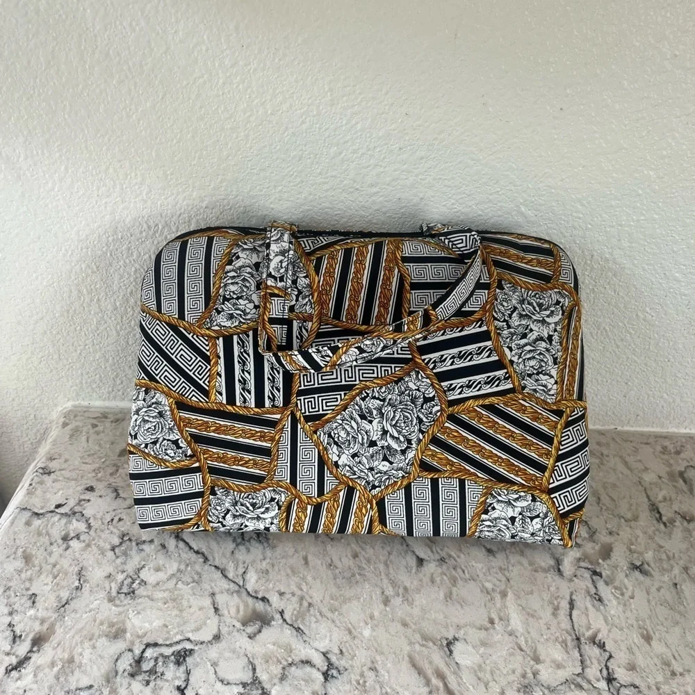 Oscar de la Renta Black and White Cosmetic Bag with Geometric Design